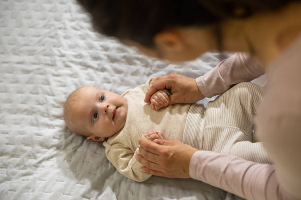istock Parent and baby relaxing at home 1494778931