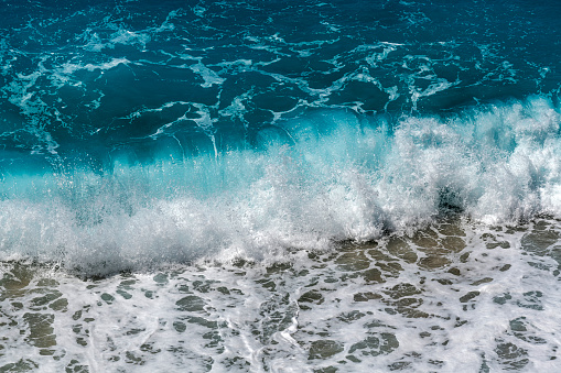 Waves in the famous Kaputas bay (Kaputaş) in Kaş district of Antalya province.Rocks and waves in the famous Kaputas bay (Kaputaş) in Kaş district of Antalya province.