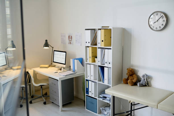 istock Office of doctor pediatrician with workplace 1494783205