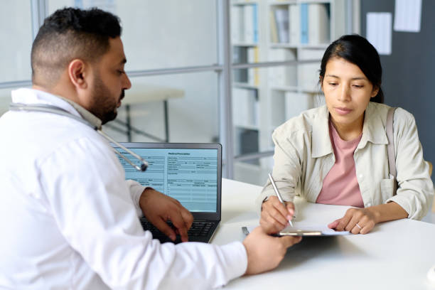 istock Woman signing document for treatment 1494783364