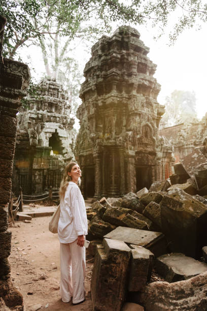 istock Traveler Exploring Ancient Ruins of Ta Prohm Temple at Angkor 1494786140