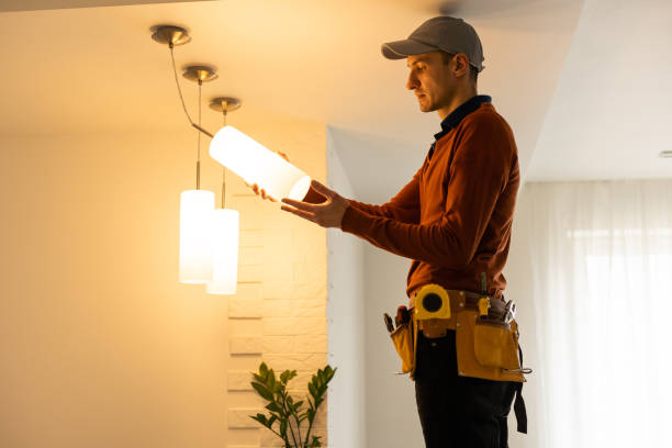istock Electrician worker installation electric lamps light inside apartment. Construction decoration concept. 1494788515