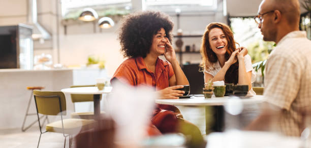 istock Friends having a good time, chatting over coffee in a restaurant 1494789264