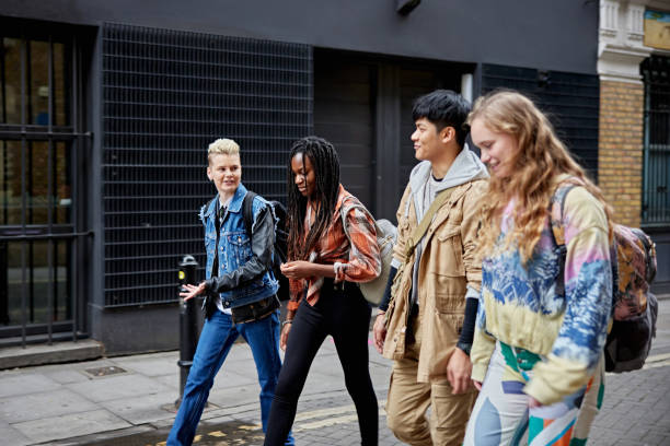 istock Casually dressed young Londoners walking in East End 1494789349