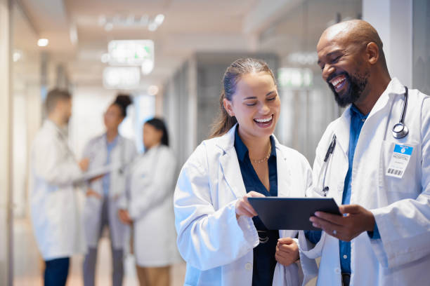 istock Doctors teamwork on tablet for hospital research management, employees workflow or software clinic solution. Healthcare people on digital tech for medical team analysis, results or problem solving 1494802221
