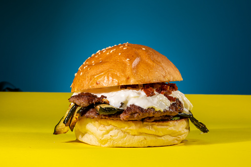 America burger on blue and yellow background
