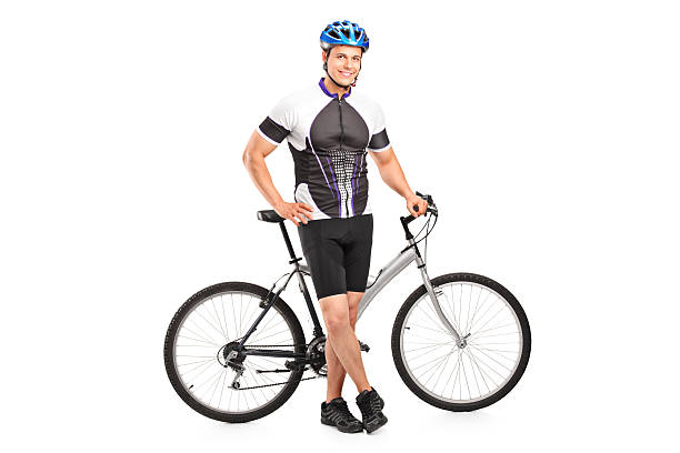 istock Smiling bicyclist posing next to a bicycle 149480800