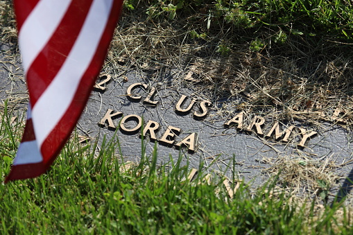 Korean War US Army Cemetery Tomb and American Flag.