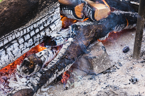 Outdoor cooking using open firewood, fireplace with  wood burning