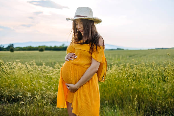 istock Pregnant woman in nature 1494813383