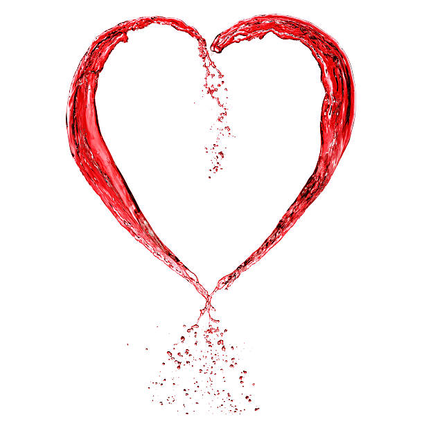 istock Valentine heart made of red wine splash isolated on white 149481402