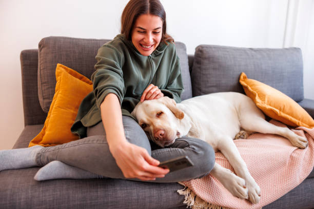 istock Woman taking a selfie with her dog 1494817714
