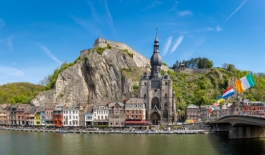 Dinant, Belgium, 04.05.2023, Panoramatic view of of Dinant on the shores of the Meuse river with famous citadel and gothic collegiate church