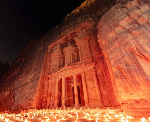 istock Jordan Petra Monastery with candles burning in front of it at night 1494827890
