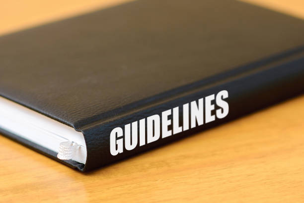 istock Guidelines black book on the wooden table. 1494828595