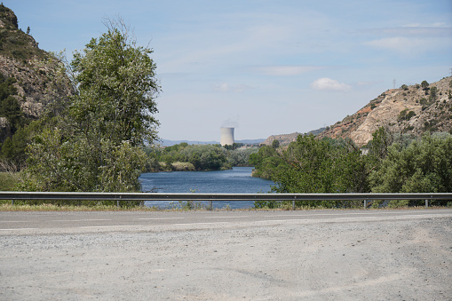 Nuclear power plant on the Rio Ebro in Spain with a cooling tower in a beautiful landscape