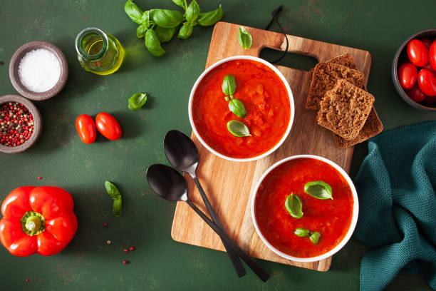istock tomato and bell pepper vegetarian soup on green background 1494832082