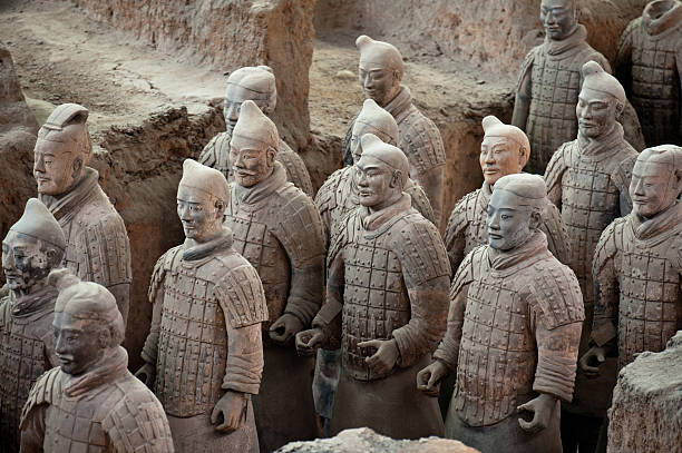 High angled view of the detailed Terracotta Warriors statues A section of over 8000 Terracotta Warriors in the mausoleum of the first Qin emperor outside Xian, China. qin dynasty stock pictures, royalty-free photos & images