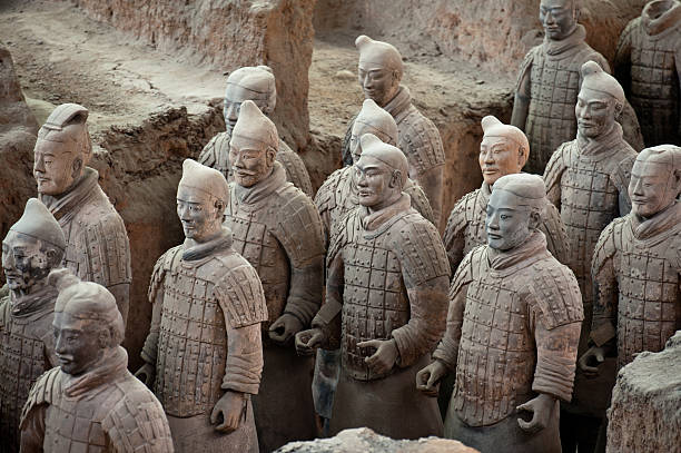 High angled view of the detailed Terracotta Warriors statues A section of over 8000 Terracotta Warriors in the mausoleum of the first Qin emperor outside Xian, China. terracotta soldiers stock pictures, royalty-free photos & images