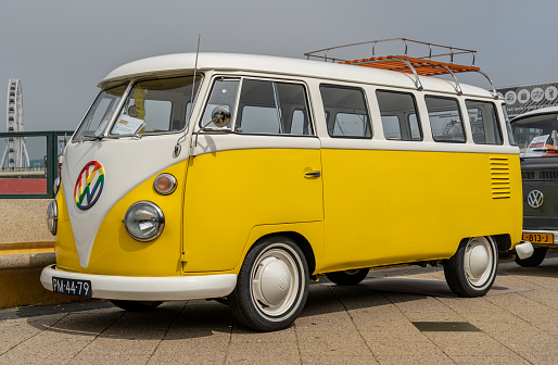 Scheveningen, The Netherlands, 14.05.2023, Vintage Volkswagen Kombi from 1964 in yellow colour at The Aircooled classic car show