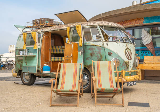 Scheveningen, The Netherlands, 14.05.2023, Vintage Volkswagen microbus camper van from 1962 with beach chairs displayed at The Aircooled classic car show