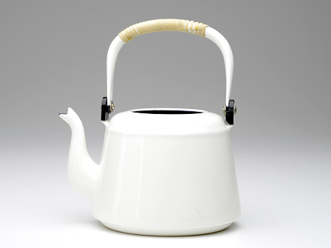 a white teapot isolated on white background