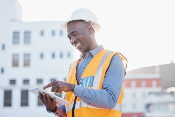 istock Engineering, tablet and search with black man in city for construction, building and architecture. Maintenance, inspection and technology with employee for contractor, digital and project management 1494842967