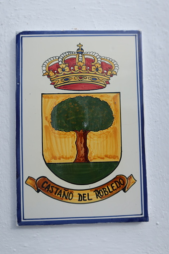 Castano del Robledo, Huelva, Spain, May 24, 2023: Coat of arms of the Andalusian magical town of Castaño del Robledo, Huelva, Spain
