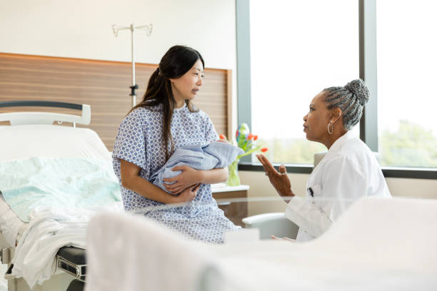 istock Pediatrician talks with the new mother about next steps once she's discharged 1494852350