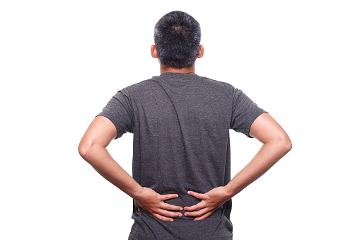 Man suffering from backache isolated on white background