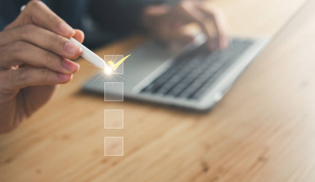istock Businessman checking mark the check box. questionnaire and business concept. 1494854035
