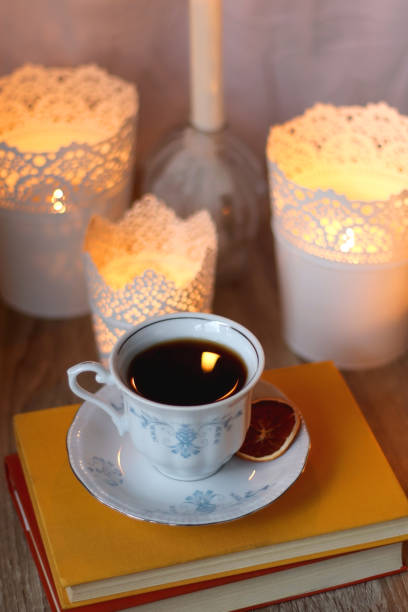 istock Books, Glasses, E-Reader, Pen, Tea, Cookies and Candles 1494856767