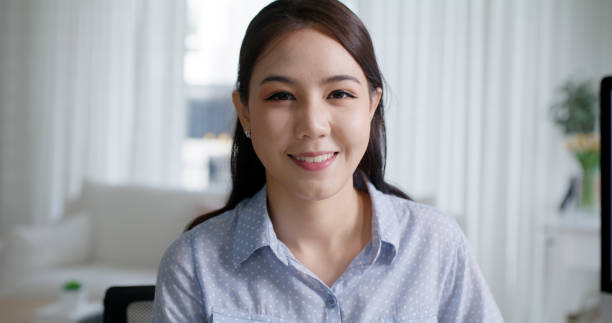 istock Reskill upskill workforce project asia woman people relax smile to camera remote work at home office. Young girl study MBA finance online class learn lesson SEO insight data analyst report training. 1494857060