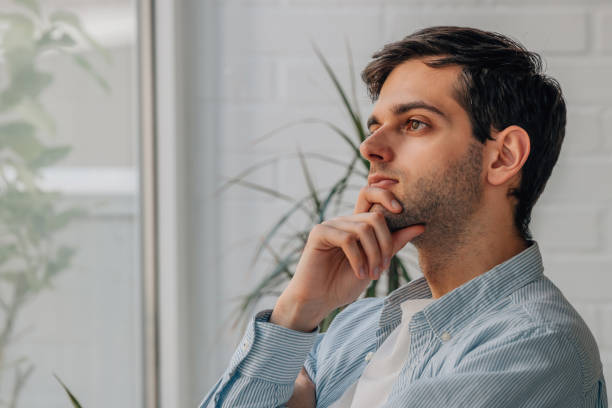 istock portrait of thoughtful young man making a decision 1494859319