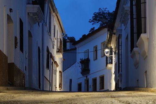 Castano del Robledo, Huelva, Spain, May 27, 2023: A led illuminated street of the Andalusian magical town Castano del Robledo, Huelva, Spain