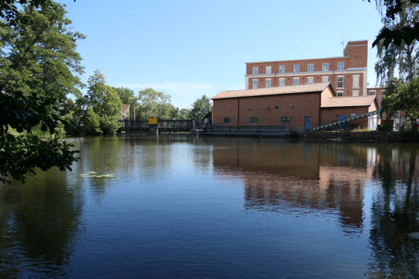 istock View of a industrial building at a stream 1494859644