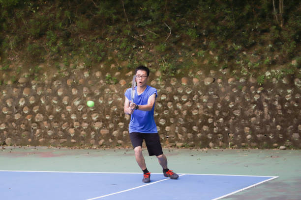 istock Tennis player playing on tennis court. 1494860821