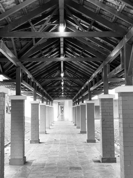 istock Black and White Symmetrical Triangular Wooden Roof with Stone Pillars 1494863333