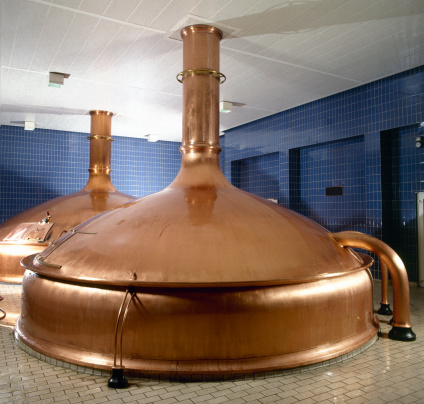 brewery workshop with copper fermentation vats
