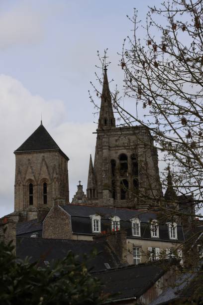 Basilica in Guingamp The Basilica of Notre-Dame de Bon-Secours de Guingamp is located in the heart of the historic city of Guingamp, in Brittany, France guingamp brittany stock pictures, royalty-free photos & images