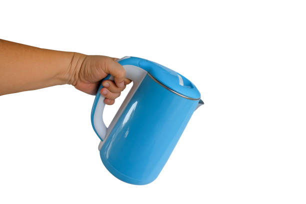 istock Hand hold an Electric kettle for boiling water on white background. 1494869451