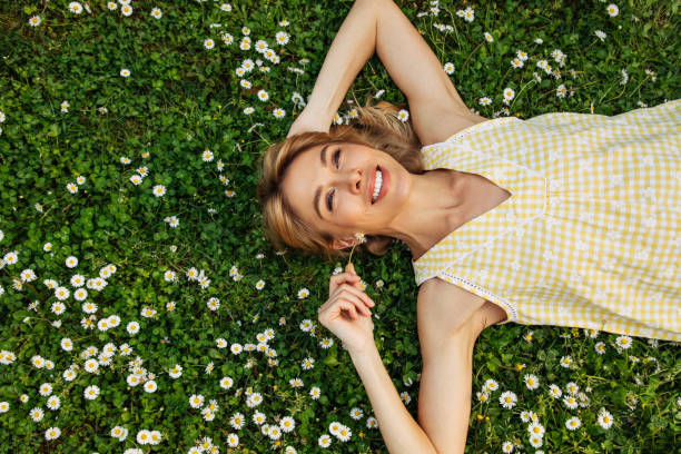 istock Smiling young woman enjoying summer 1494871117