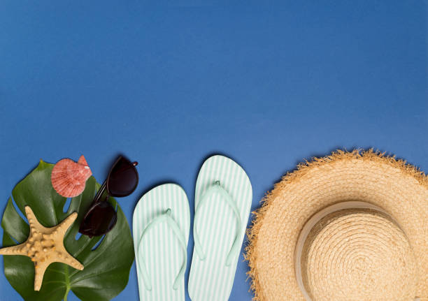 istock Beach accessories on color background, flat lay 1494873114