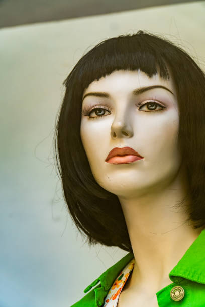 istock Portrait female mannequin window shop 1494876767