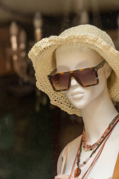 istock Portrait female mannequin  store window shop 1494876773