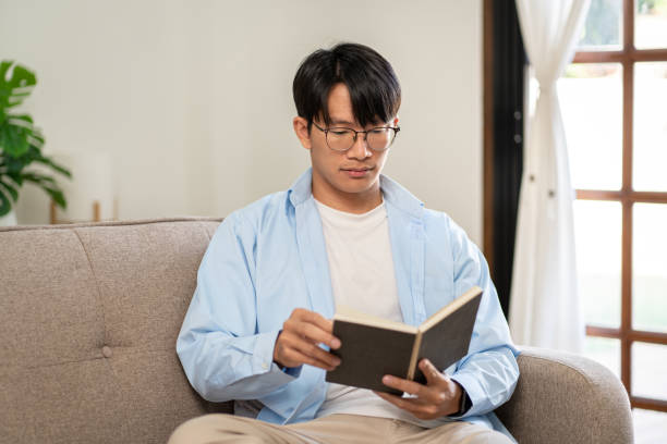istock Businessman in casual is sitting on comfortable sofa to relaxati 1494879272