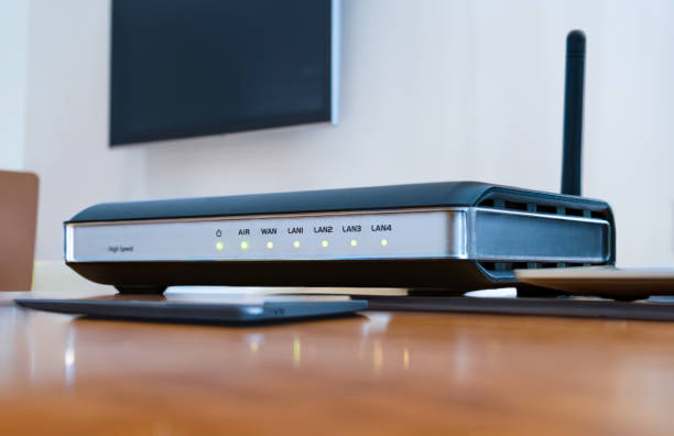 istock Home internet router on desk from home office 1494880332