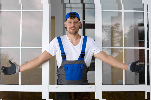 istock Attractive Caucasian man in overalls arms outstretched, demonstrating work done 1494881743
