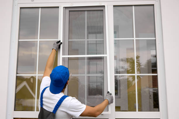 istock Professional installation of protective nets on windows of different sizes 1494885858