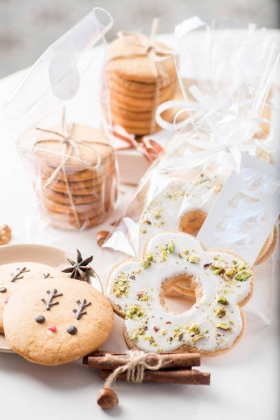 istock Various cookies and gingerbread with glaze in packages 1494886426